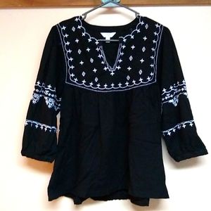 Black 3 quarter length sleeved blouse with white stitching